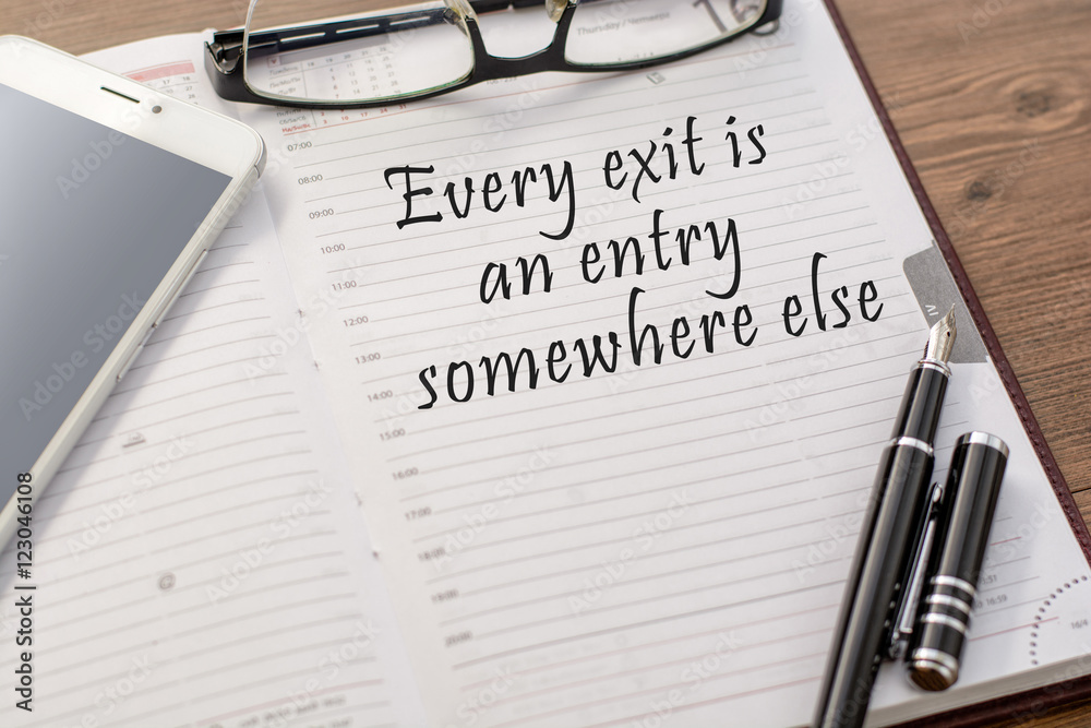 Fototapeta premium Blank in a notebook (the diary) and a mobile phone, glasses, fou