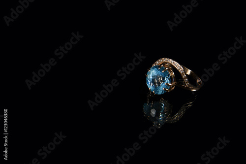 Golden ring with gemstones © n3chip