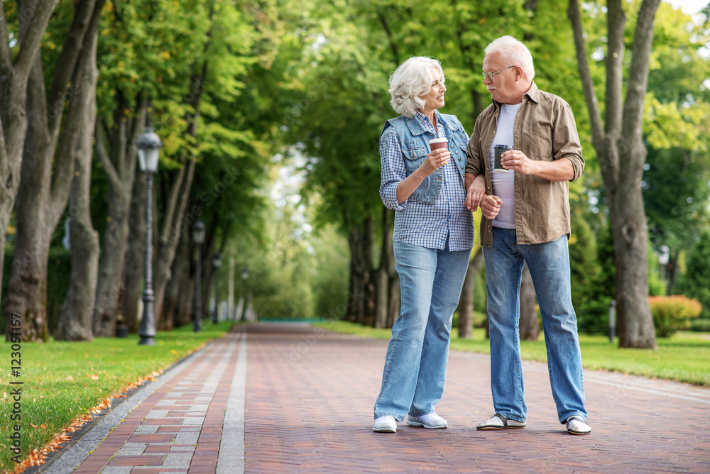 Old husband and wife walking in nature Old husband and wife walking in nature