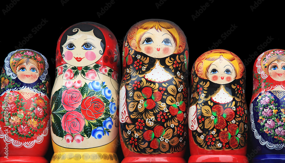 Wooden dolls standing in a row