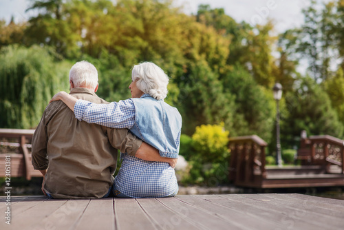 Mature man and woman enjoying nature view