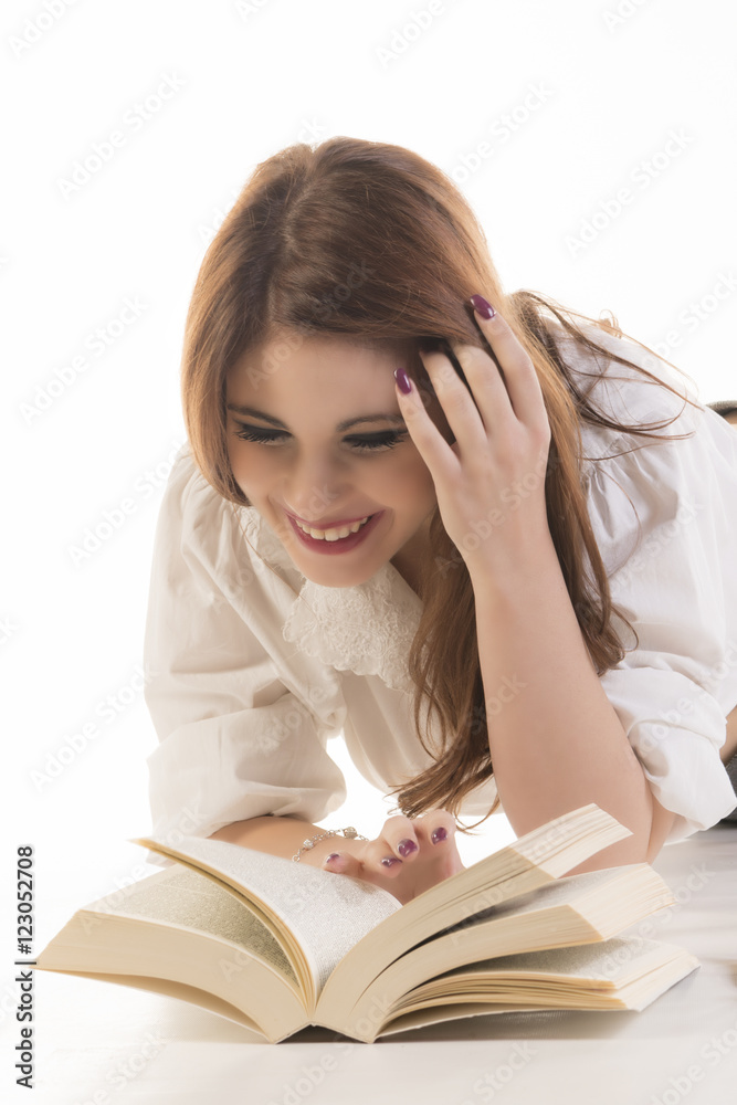 Attractive Woman With Two Books Lying On Floor Attractive Woman With Two Books Lying On Floor