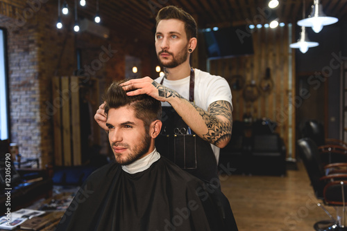 customer choosing what haircut he wants