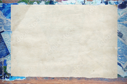 Creative vintage background. Border, frame, template for presentation. Collage on a wooden board. Blue. Craft paper texture