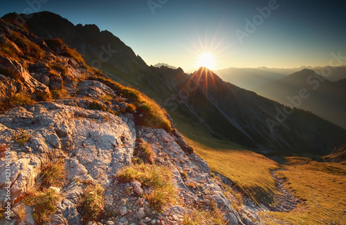 sunrise in rocky Alps