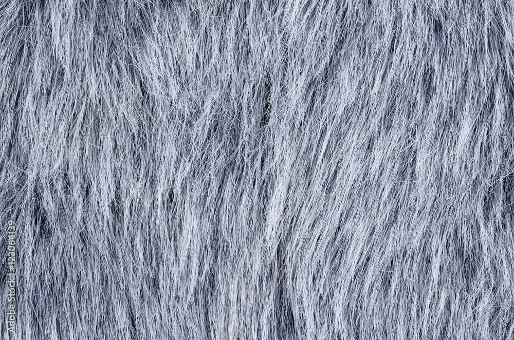 Gray fake fur horizontal. Wolf similar faux fur made of synthetic