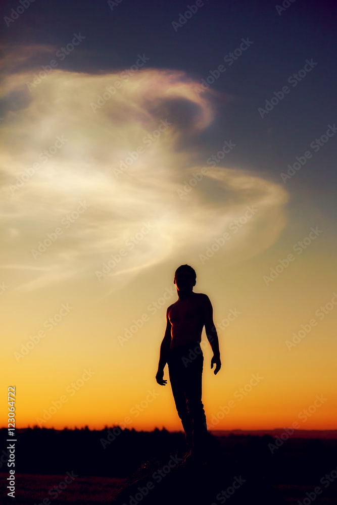 Silhouette of man at sunset, follow your dream