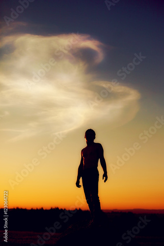Silhouette of man at sunset, follow your dream