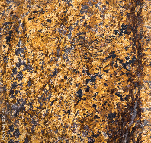 Surface of the mineral bronzite. Patterns and textures for abstract background and wallpaper. photo