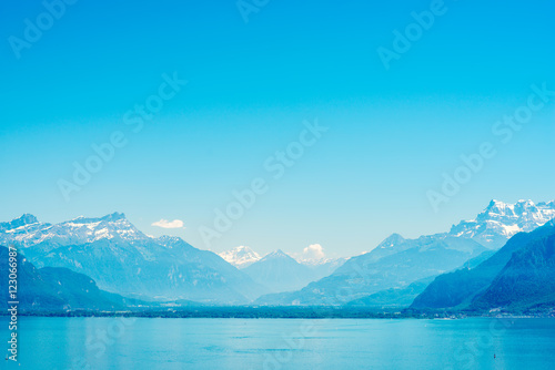 Landscape view on Geneva lake with beautiful mountains in Switzerland
