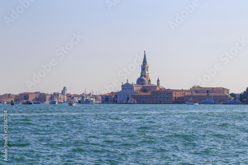 Boats and motor boats in the Giudecca Canal in the Italian city of Venice