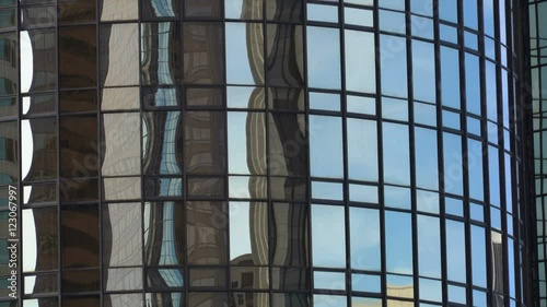 Reflective Building Window -Long Shot / Tilt Up- photo