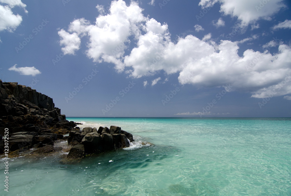 Beautiful waters and skies of of Ffryes beach, near south end Beautiful waters and skies of of Ffryes beach, near south end