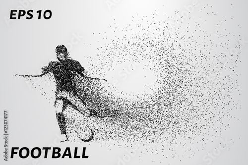 Fototapeta Silhouette of a football player from the particles