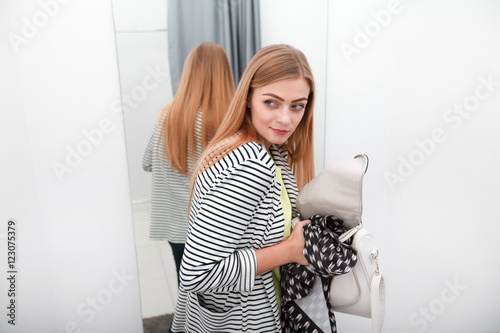 Woman stealing a dress