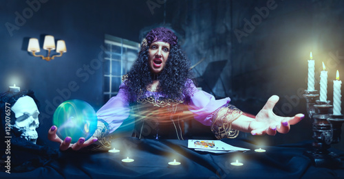 Fotografi Crazy sorceress practising witchcraft