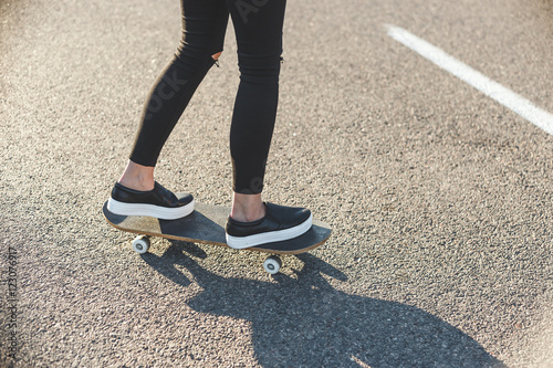 skateboarding girls legs at skatepark