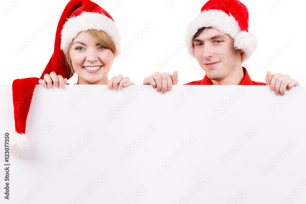 Couple with blank empty banner board. Christmas Couple with blank empty banner board. Christmas