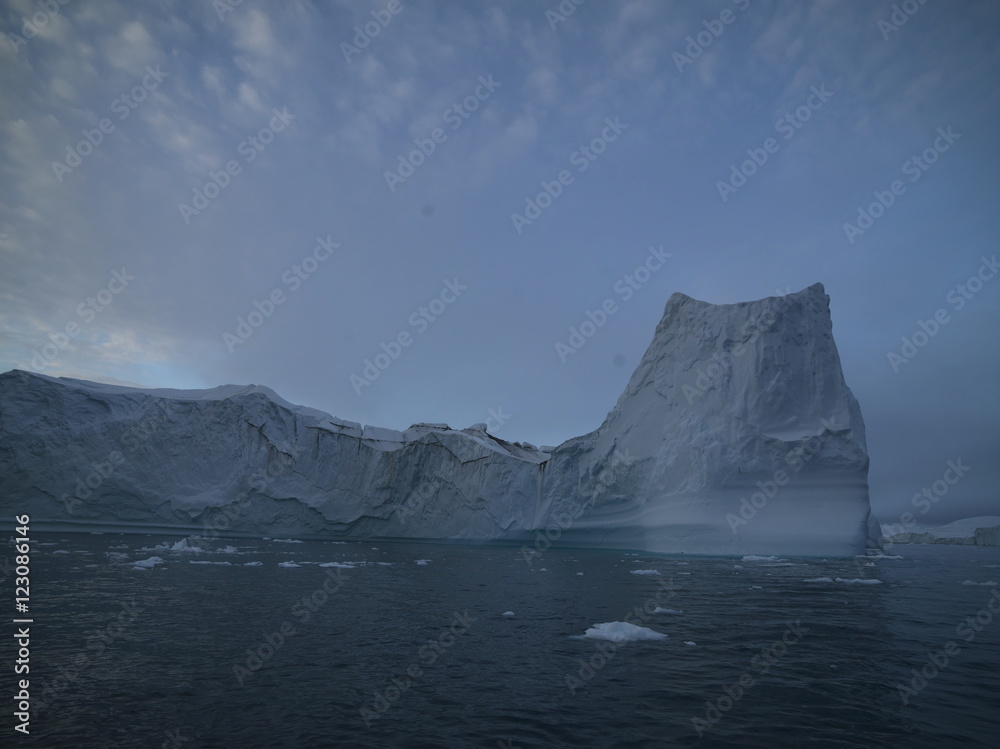 beautiful icebergs are melting on arctic ocean