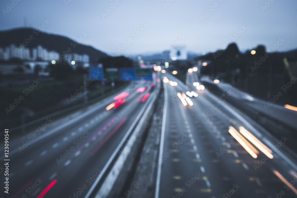 A city traffic captured at night using bokeh technique.