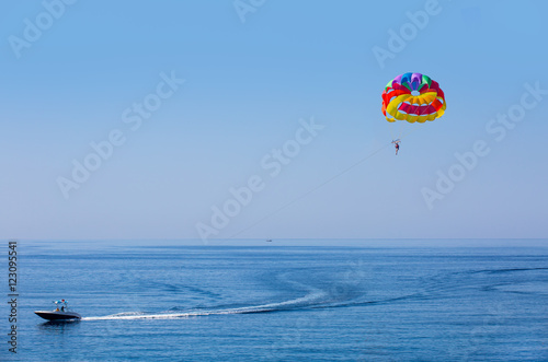 Parasailing in a blue sky in Alanya