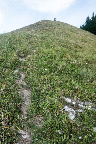 pathway on mountain meadow on Lysec hill summit in Velka Fatra mountains in Slovakia photo