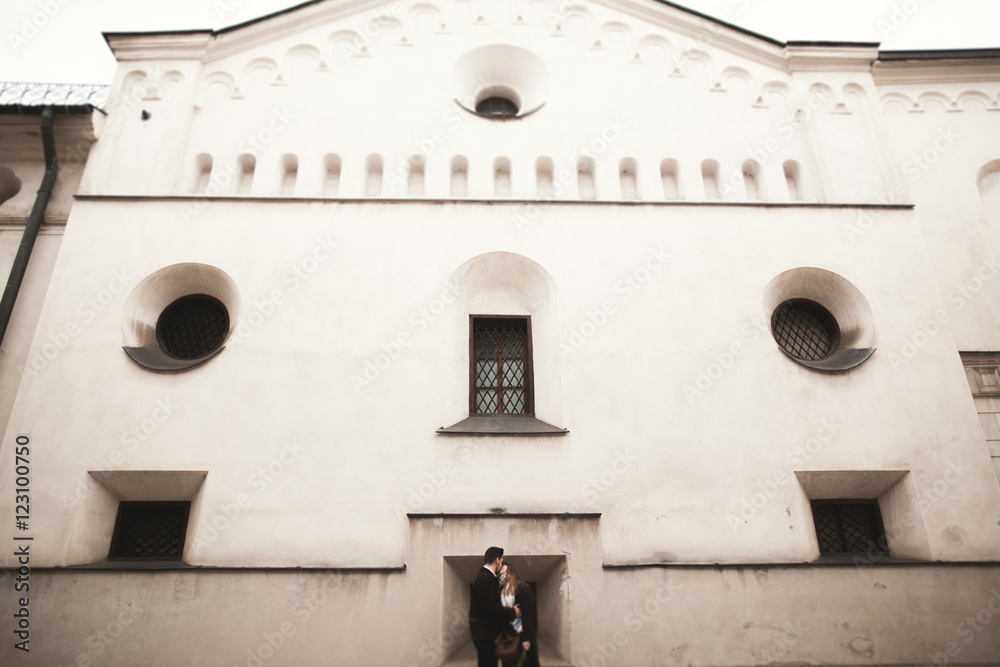 Loving couple posing in the old town