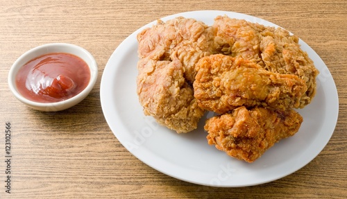 Fried Chicken with Sauce on A White Dish