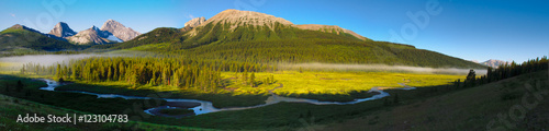 Early morning mist in scenic rocky mountains © BGSmith