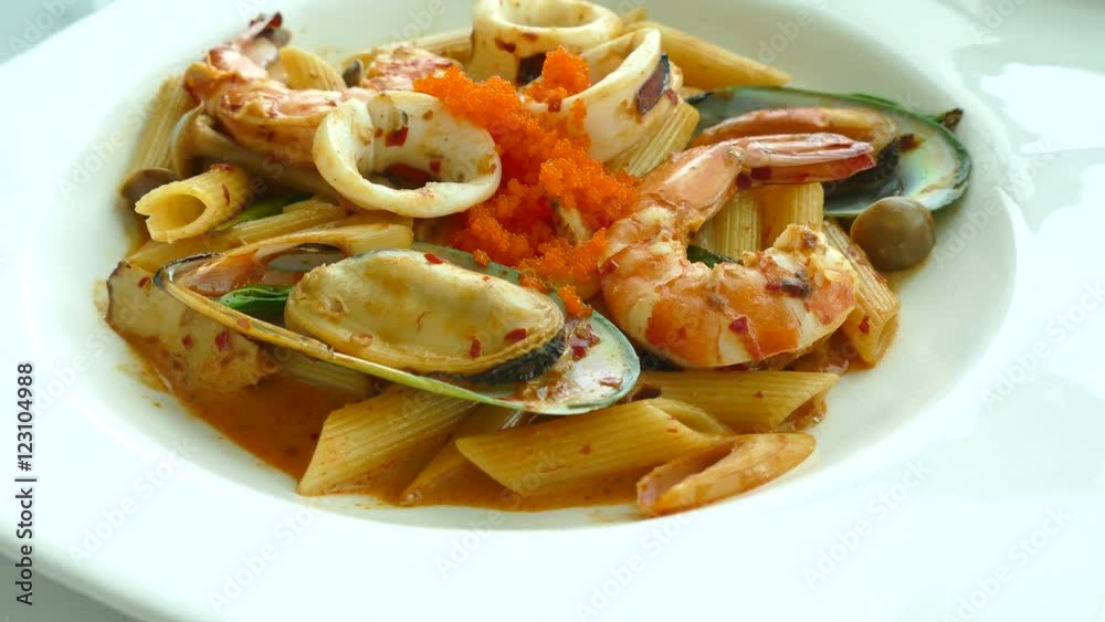 Spaghetti tom yum seafood in white plate
Spaghetti tom yum seafood in white plate