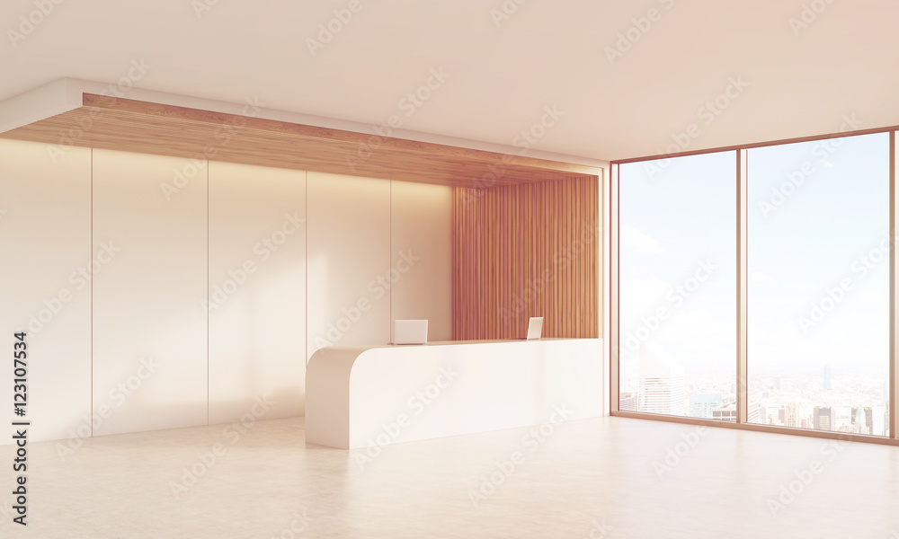 Side view of sunlit reception desk with window Side view of sunlit reception desk with window