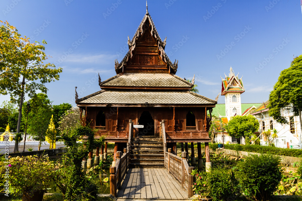 Fototapeta premium Thai wooden temple architecture Wat Thung Si Muang ,Ubon ratchatani.Thailand.