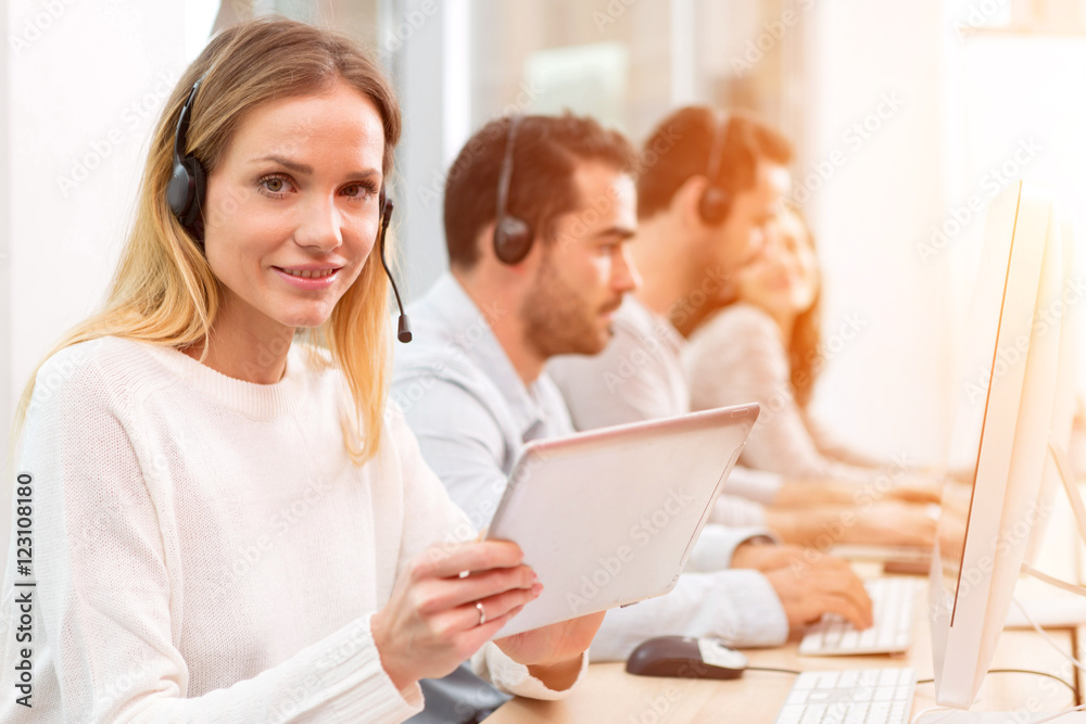 Young attractive woman working in a call center Young attractive woman working in a call center