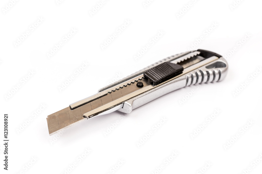 Metal construction scalpel on the white background Metal construction scalpel on the white background