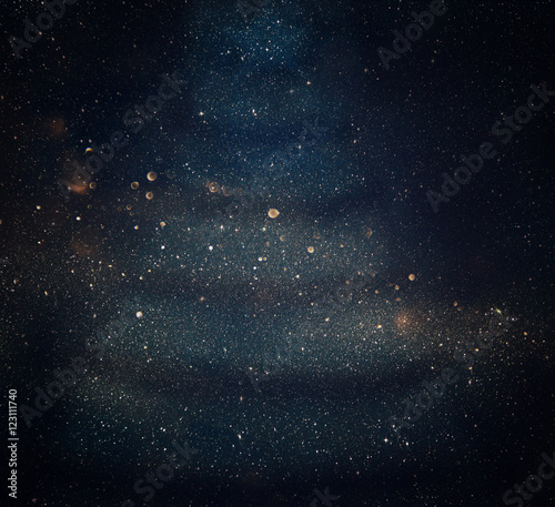 Defocused abstract gold and blue lights background