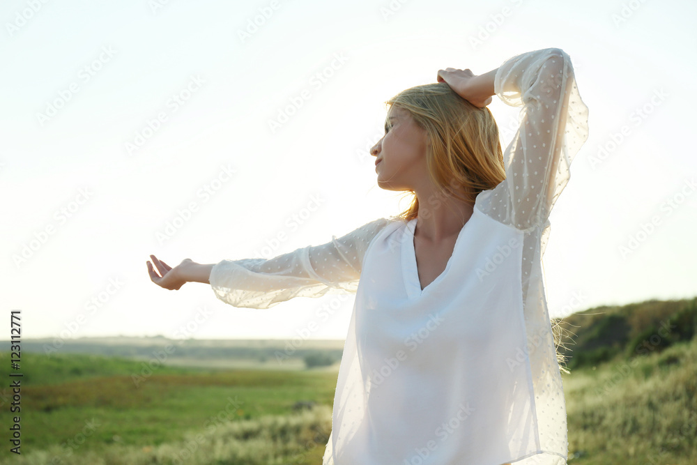 Young woman in field Young woman in field