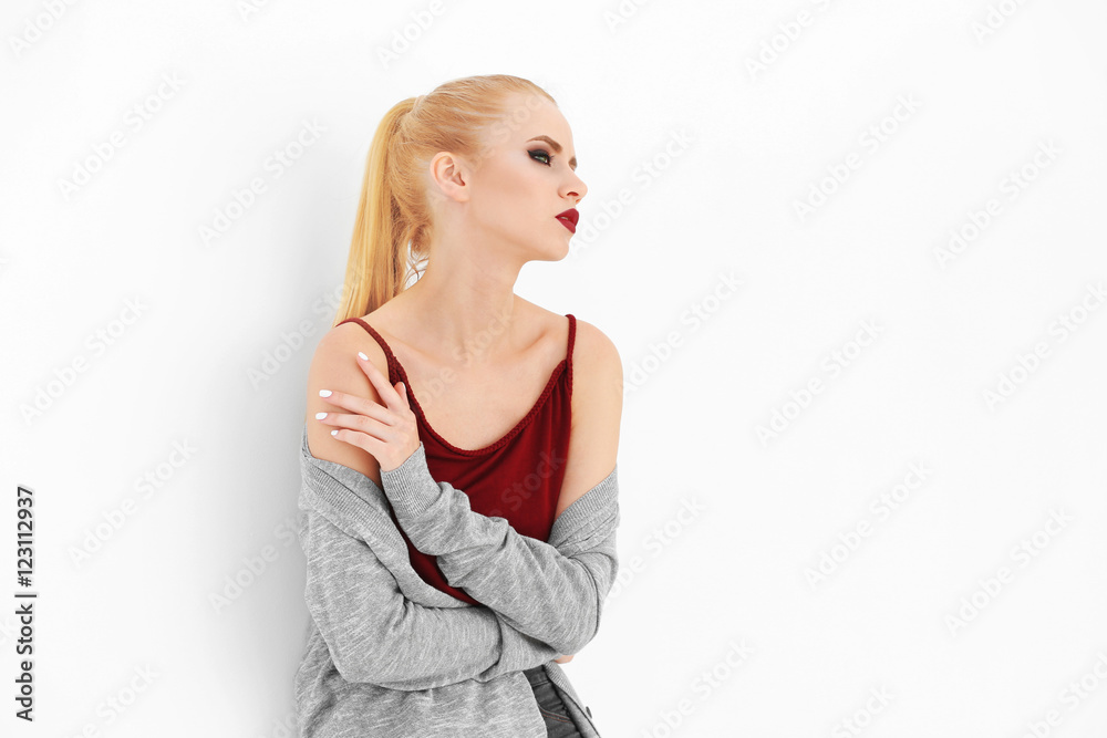 Pretty young blonde woman in casual clothes isolated on white Pretty young blonde woman in casual clothes isolated on white