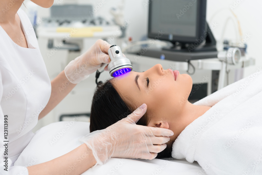 Pretty girl getting cavitation treatment Pretty girl getting cavitation treatment