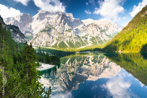 Lake Braies also known as Lago di Braies. The lake is surrounded by the mountains which are reflected in the water.1st point of the trekking route Alta Via 1, The Dolomites, Alps, South Tyrol, Italy.  photo