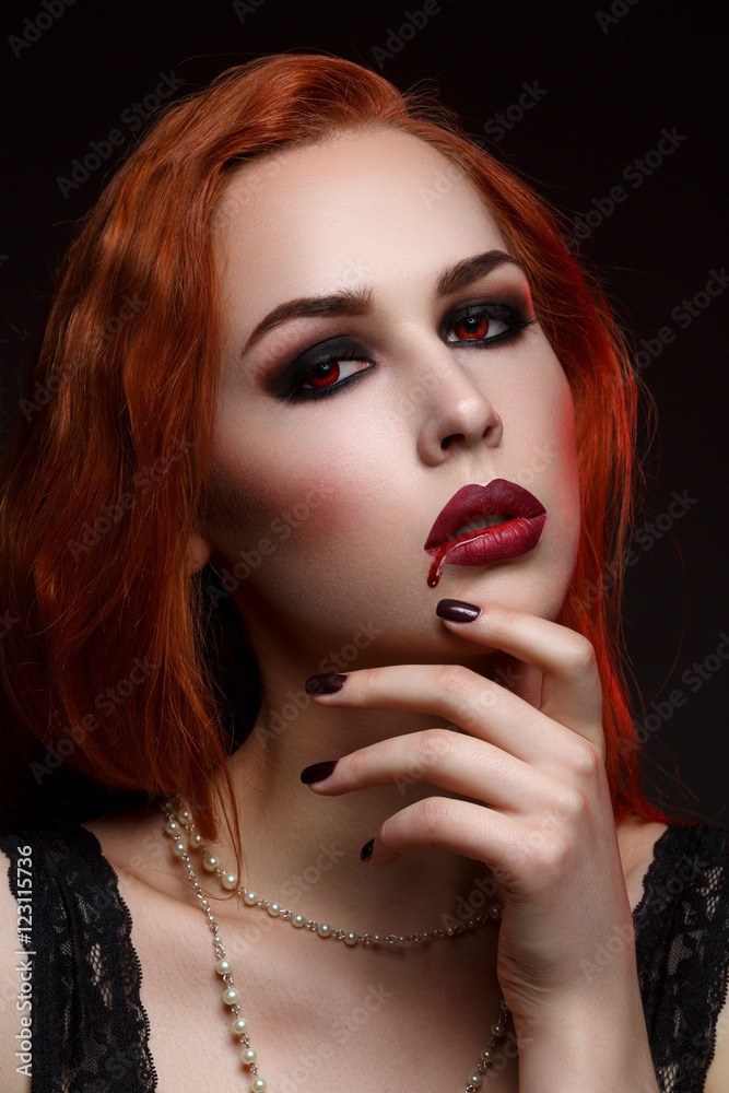 Fototapeta premium Beautiful vampire young woman