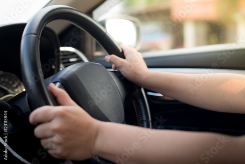 blurred woman driving a car