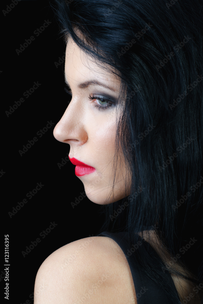 Portrait of the beautiful sad girl isolated on black background Portrait of the beautiful sad girl isolated on black background