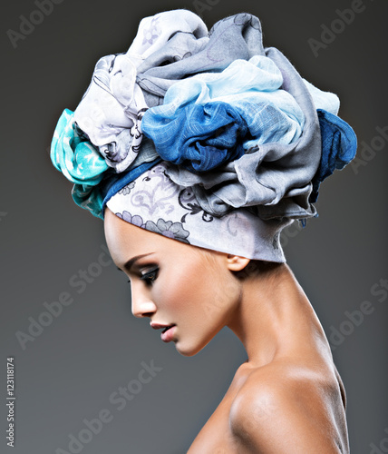 Profile portrait of beautiful  girl  in turban.