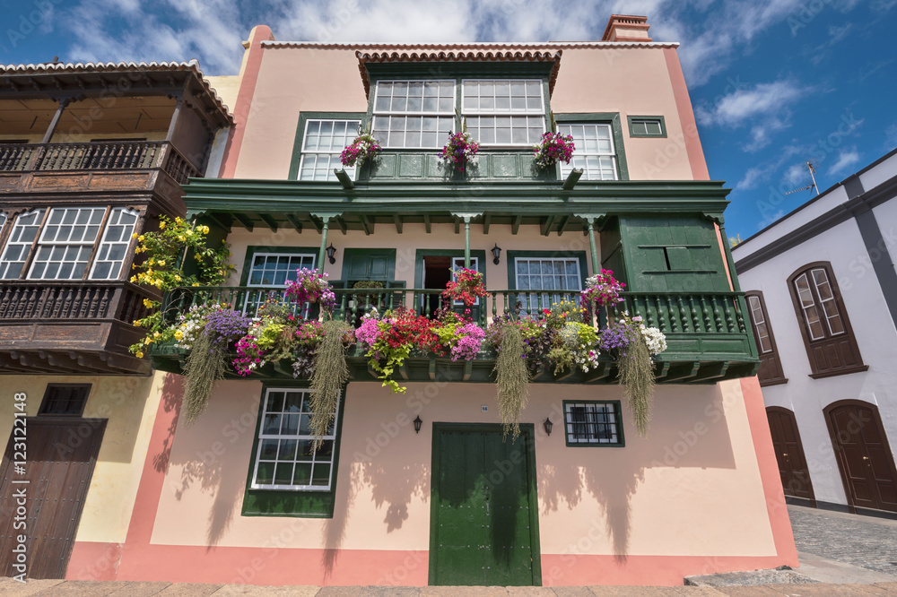 Famous ancient colorful colonies balconies decorated with flower