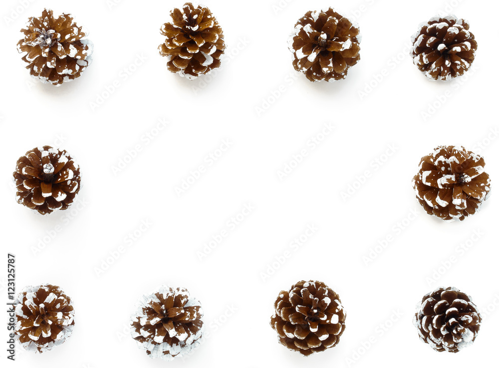 Background Frame out of snowy Pine Cones. Hand painted white for a festive winter look and isolated on white background. Background Frame out of snowy Pine Cones. Hand painted white for a festive winter look and isolated on white background.