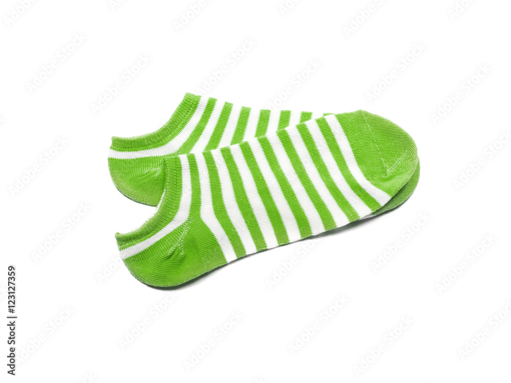 Child's striped socks, green sock for backgrounds or textures. Stock Photo Adobe Stock
