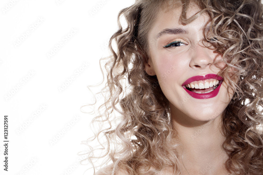pretty smiling girl with curly hair and shadow on the beauty face pretty smiling girl with curly hair and shadow on the beauty face