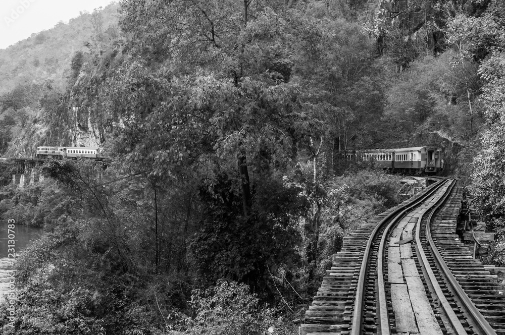 Foto de trains running on death railways track crossing kwai river in kanchanaburi thailand this