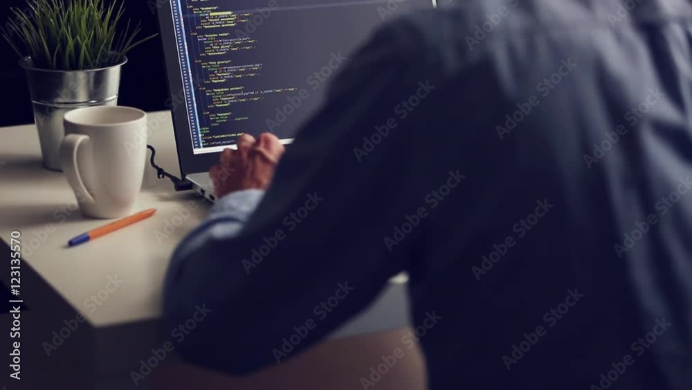 freelance programmer working on laptop from home