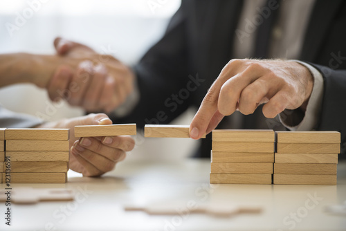 Teamwork or building bridges concept